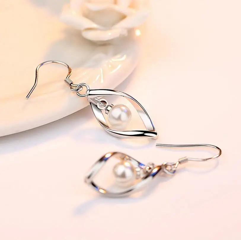 Boucles d'oreilles pendantes en forme de créole en perles