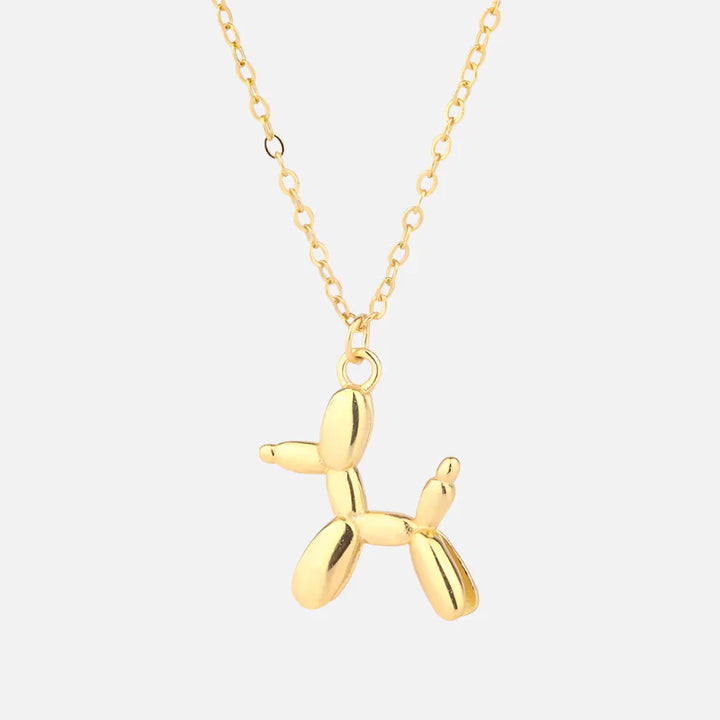 Pendentif en forme de chien en ballon doré