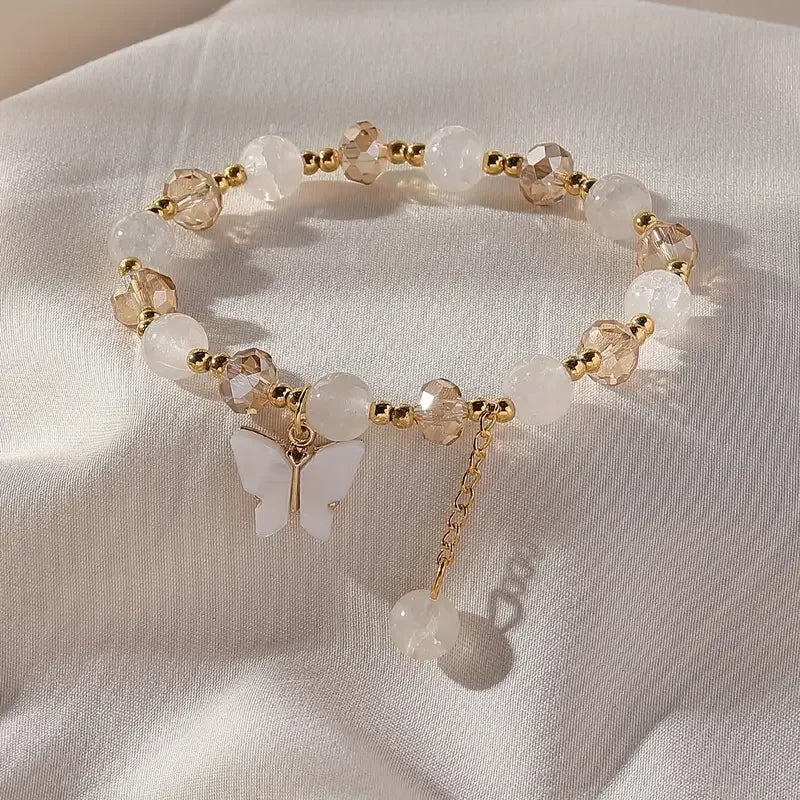 Magnifique bracelet en perles extensible en forme de papillon