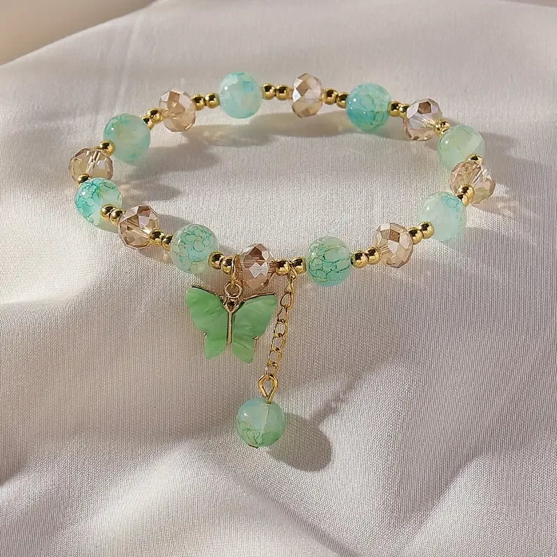 Bracelet extensible en perles avec beau papillon