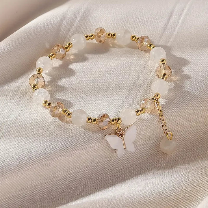 Bracelet extensible en perles avec beau papillon