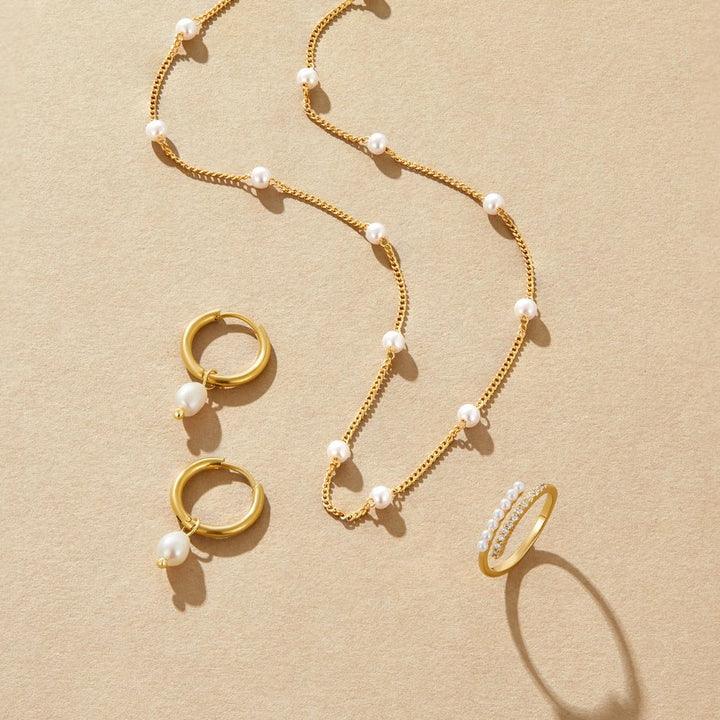Boucles d'oreilles créoles en perles essentielles