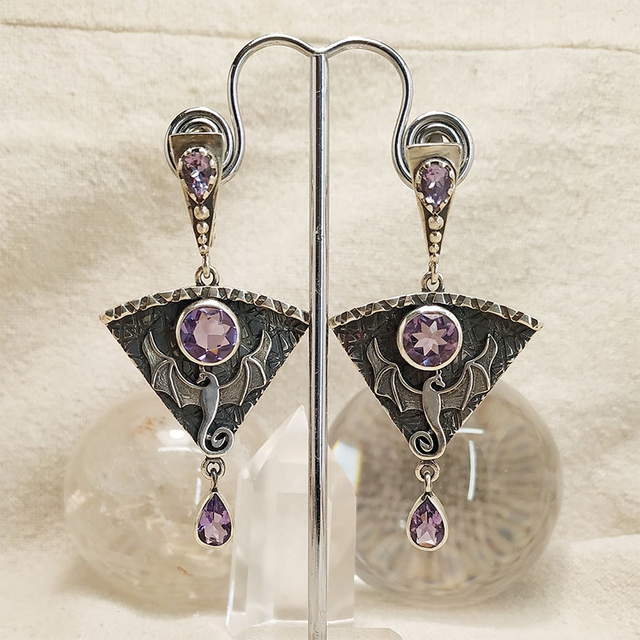Boucles d'oreilles vintage en argent et zirconia violet