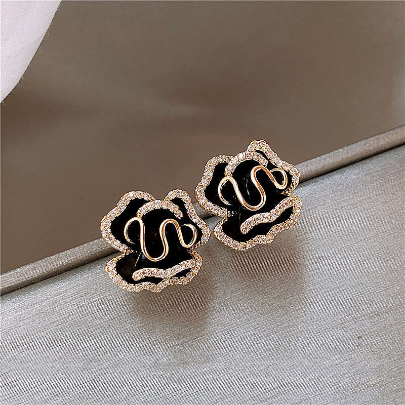 Boucles d'Oreilles Élégantes Lotus Noir en Or