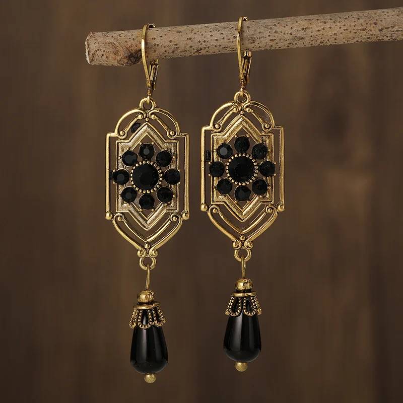 Boucles d'oreilles vintage pendantes en pierre noire