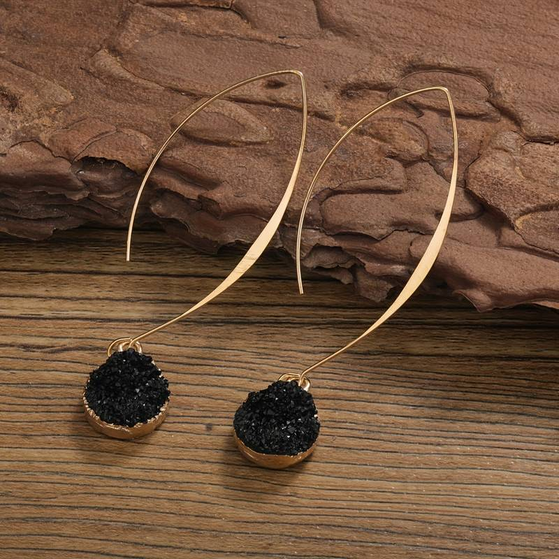 Boucles d'oreilles pendantes vintage noires et dorées