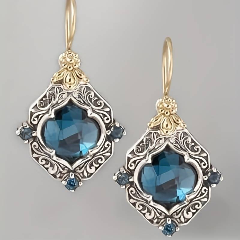 Boucles d'oreilles vintage en cristal bleu, or et argent