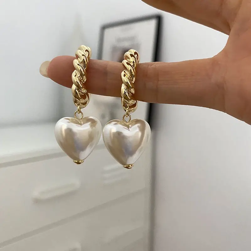 Boucles d'oreilles en forme de cœur en perles élégantes