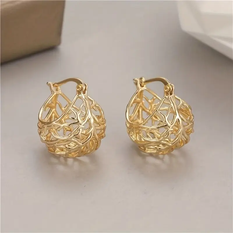 Boucles d'oreilles en sphère dorée