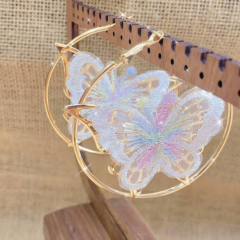 Boucles d'oreilles vintage en forme de papillon blanc
