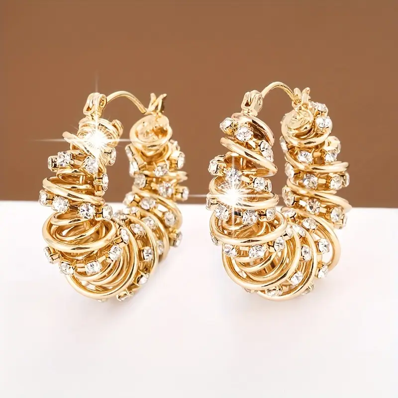 Boucles d'oreilles créoles en zirconium irrégulier doré
