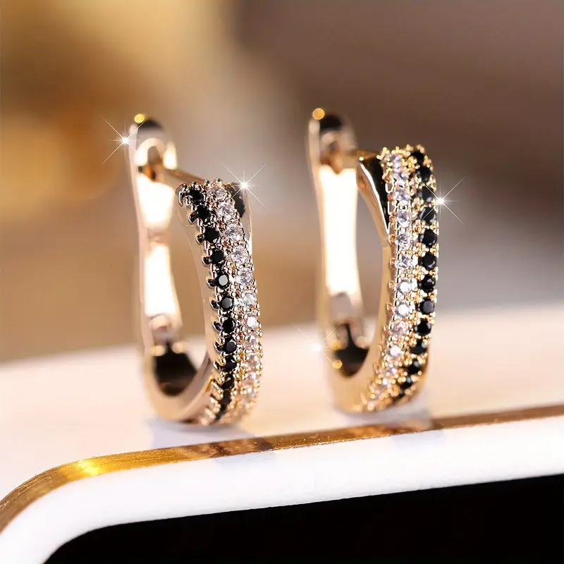Boucles d'oreilles en or avec zirconia noir