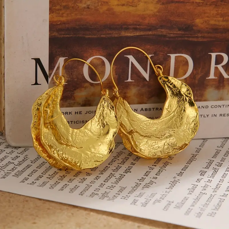 Boucles d'oreilles en panier forgé doré
