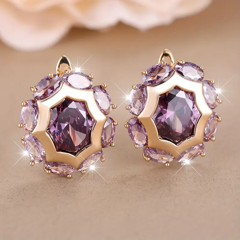 Boucles d'oreilles en or avec zirconium violet arrondi