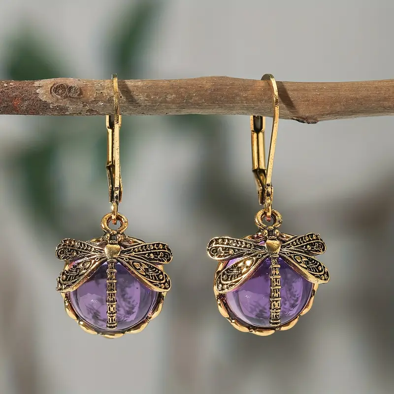 Boucles d'oreilles en cristal doré avec libellule violette