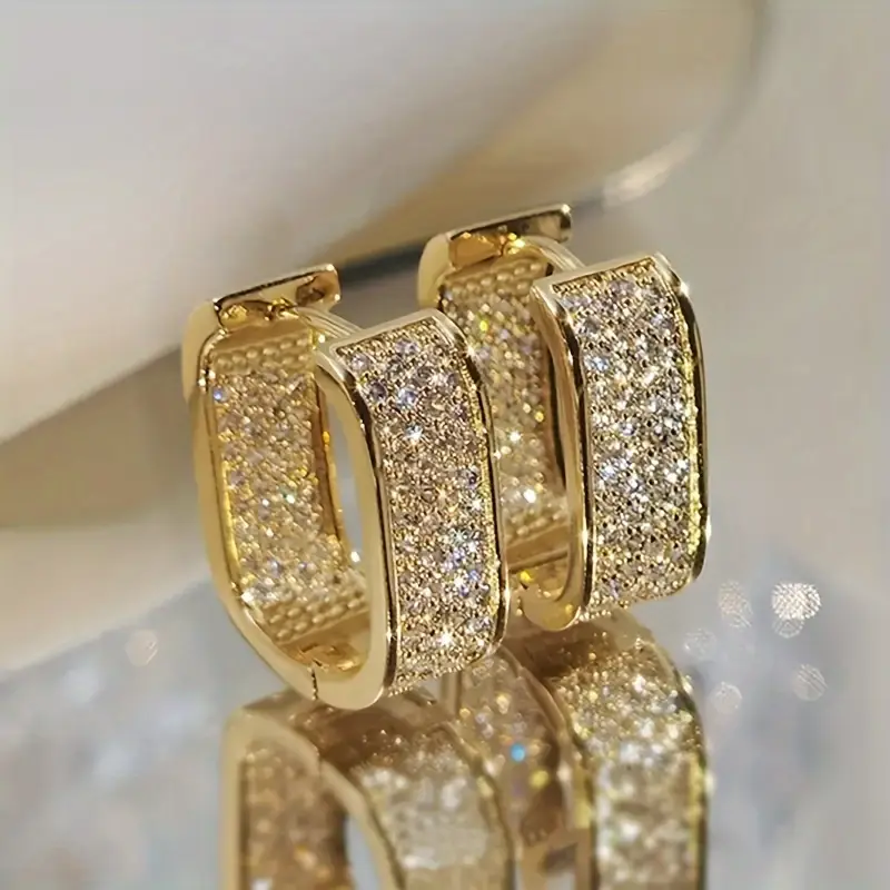 Boucles d'oreilles créoles avec strass