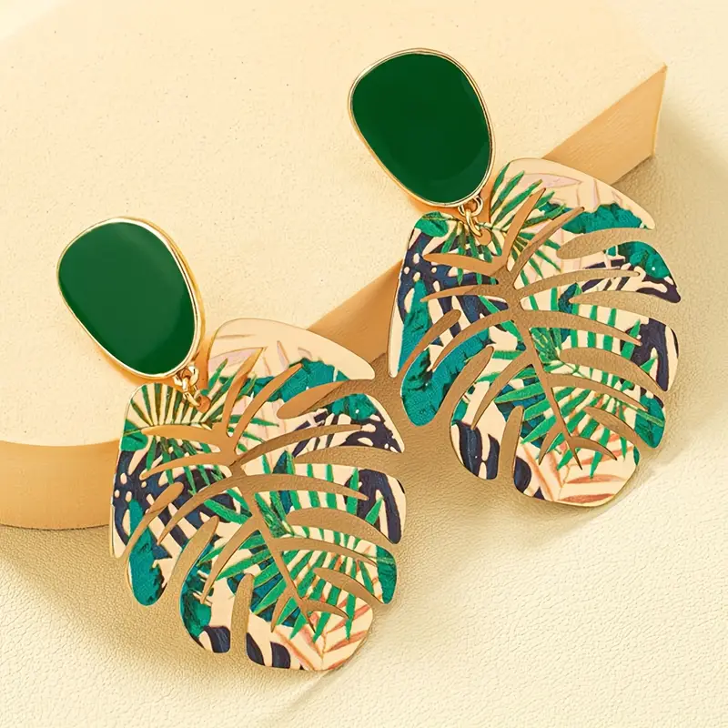 Boucles d'oreilles en feuille d'or de la jungle verte