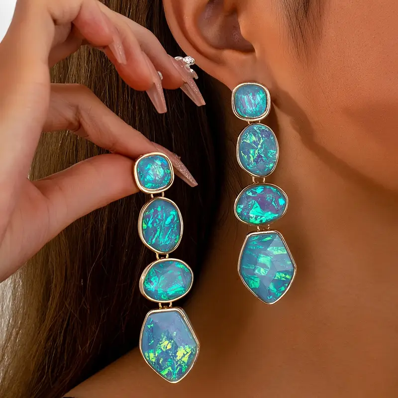 Boucles d'oreilles en opale bleue suspendues