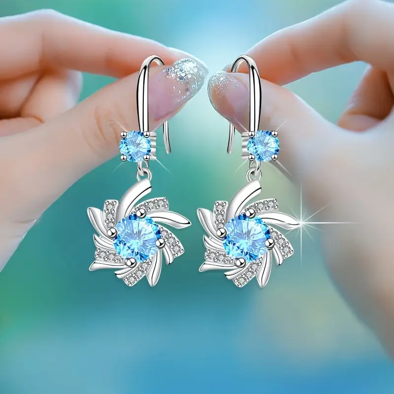 Boucles d'oreilles spirales bleues brillantes