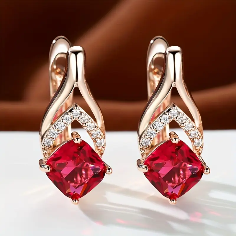 Boucles d'oreilles en cristal rouge élégant avec dorure