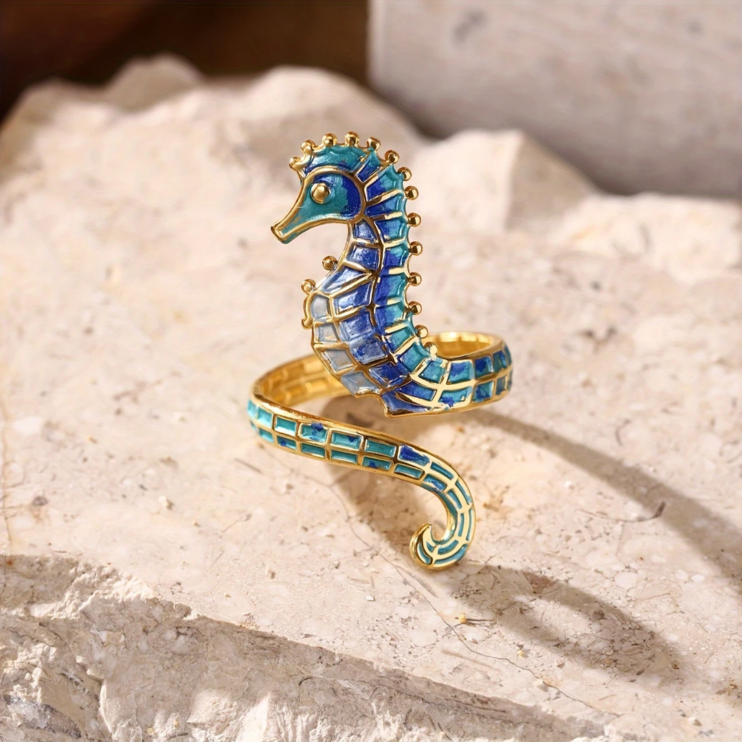 Bague en or avec hippocampe bleu ajustable