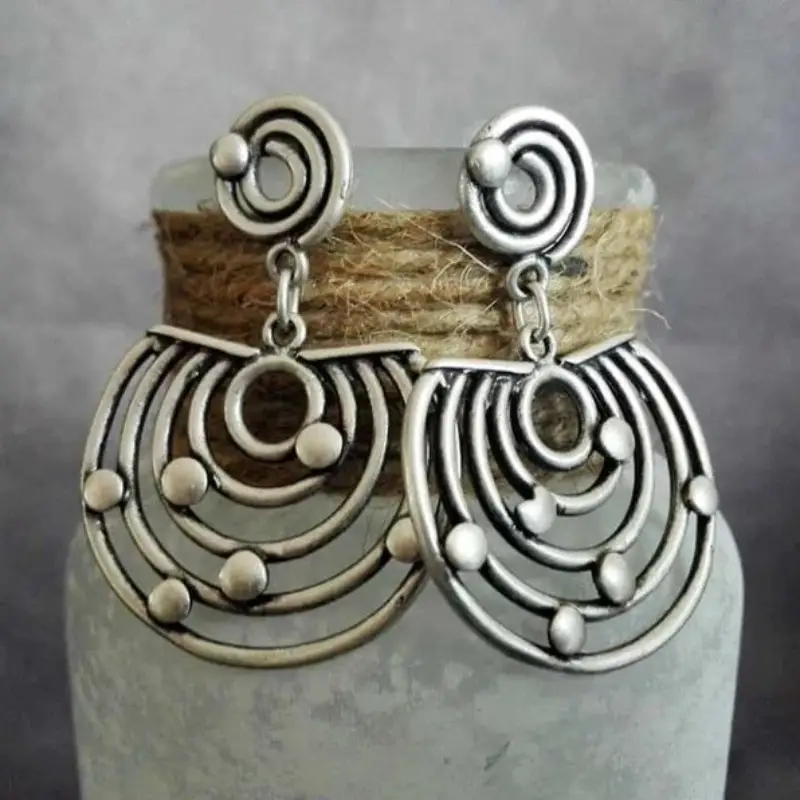 Boucles d'oreilles vintage en forme de labyrinthe