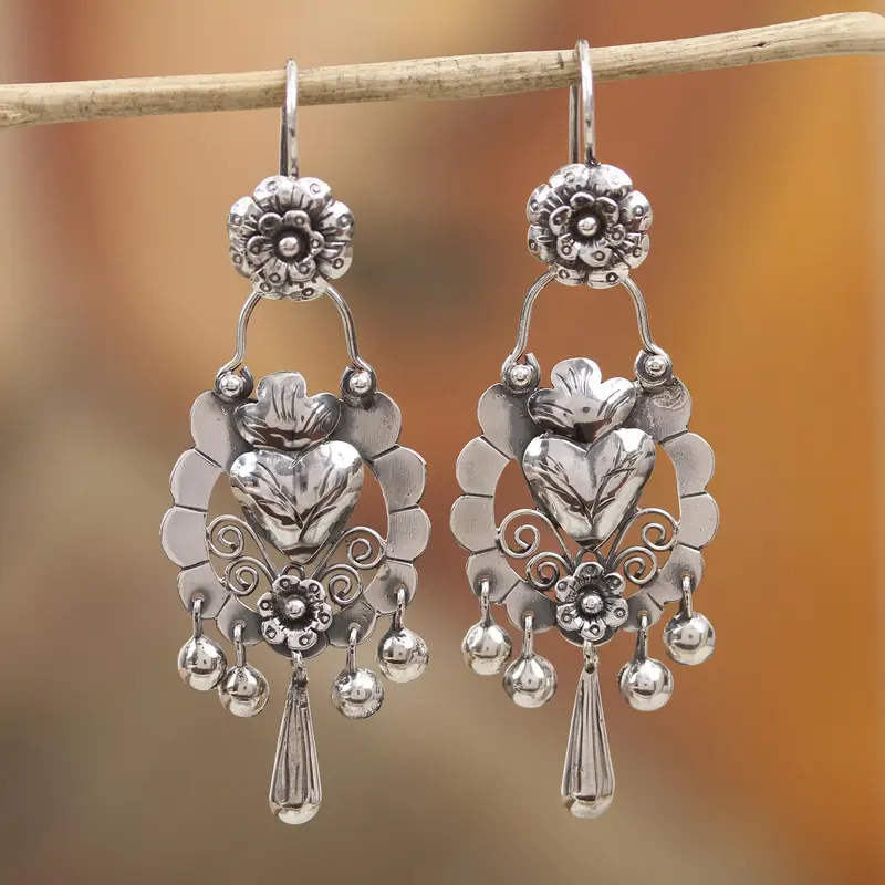 Boucles d'oreilles en cœur argenté suspendu