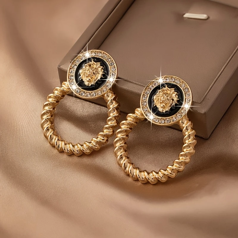 Boucles d'oreilles créoles dorées tressées