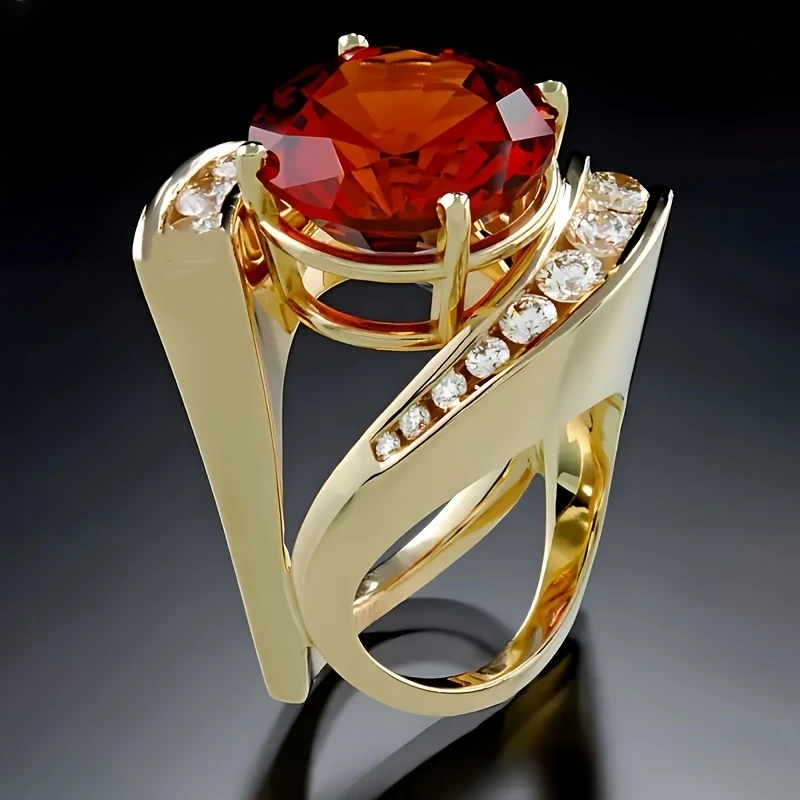 Bague dorée cristalline rouge