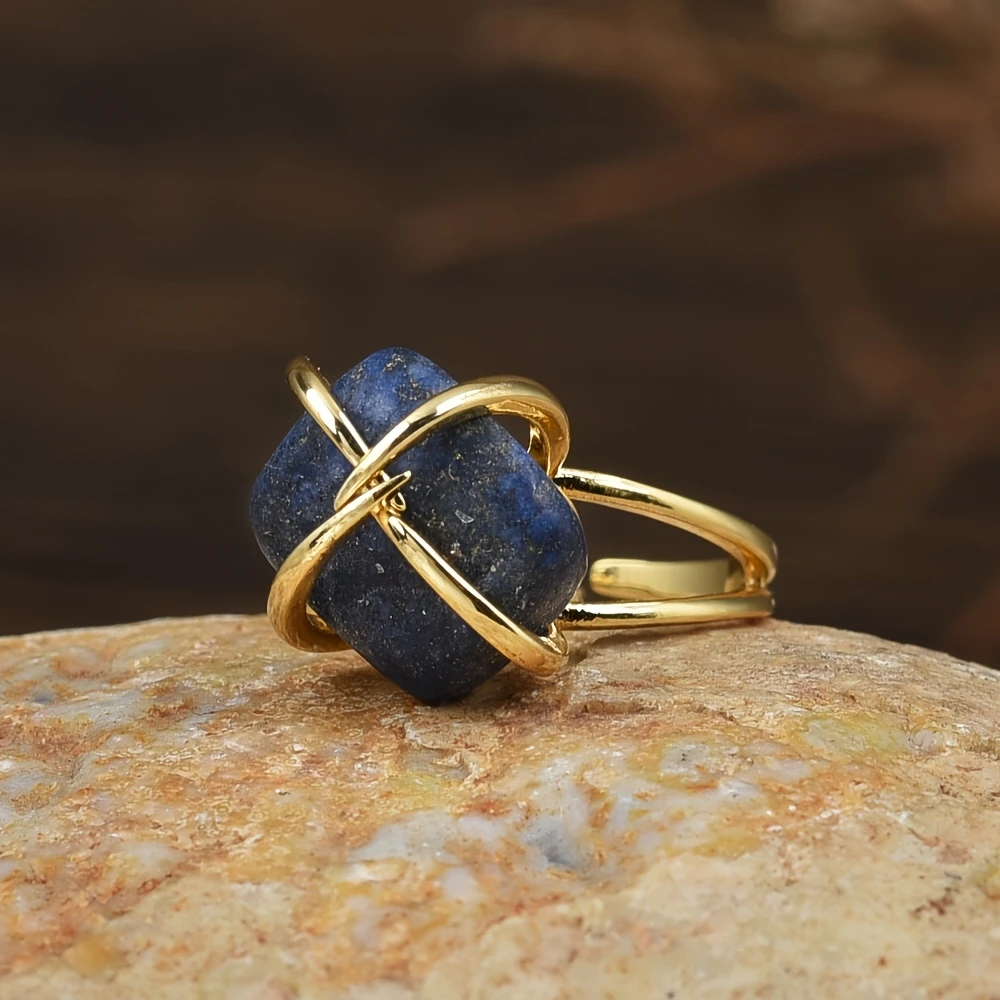 Bague en or verrouillée avec pierre bleue