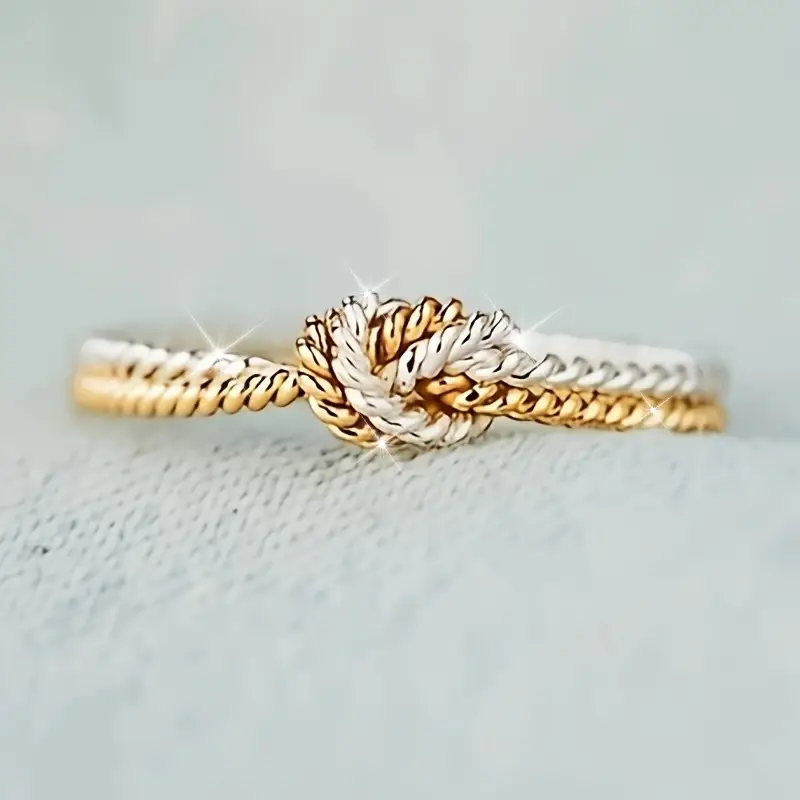 Bague nouée en or et argent