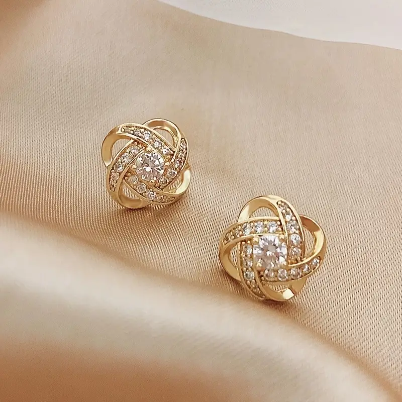 Boucles d'oreilles sphériques élégantes en cristal doré