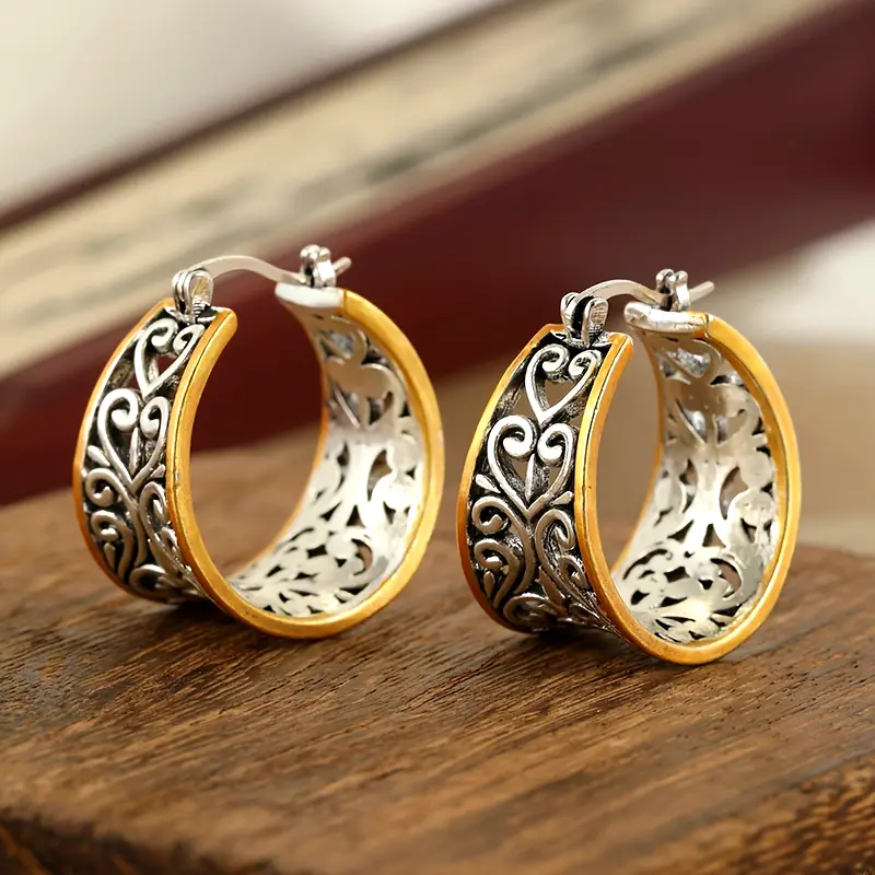 Boucles d'oreilles en or et argent en forme de lierre