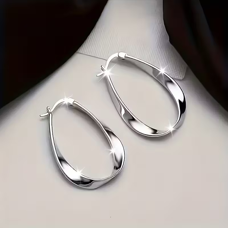 Boucles d'oreilles en argent rétro à tige torsadée