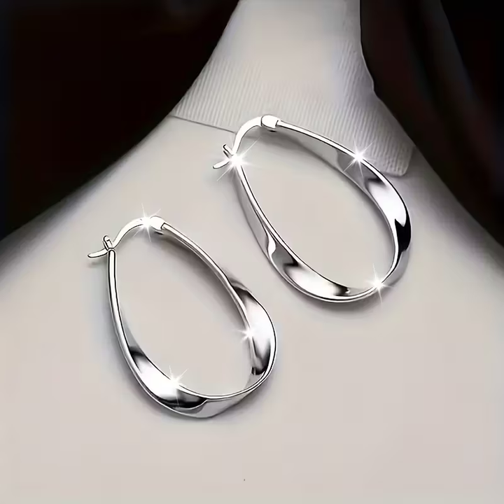 Boucles d'oreilles en argent rétro à tige torsadée