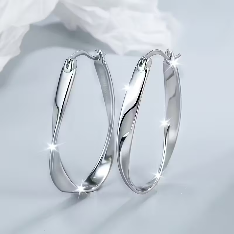 Boucles d'oreilles en argent rétro à tige torsadée
