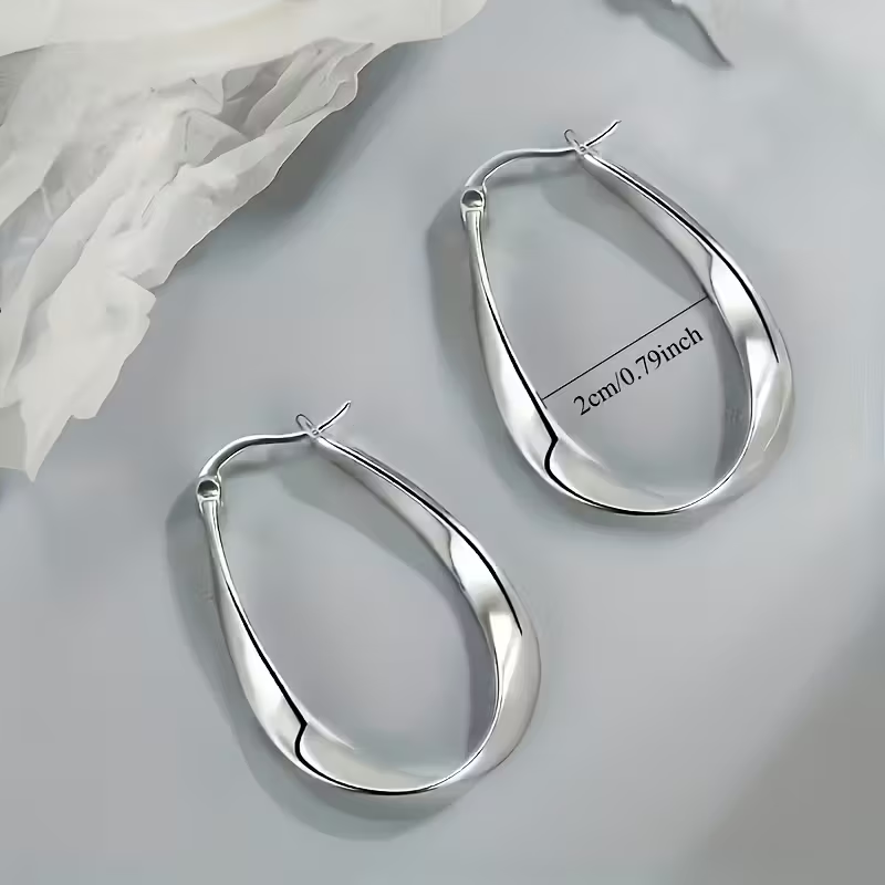 Boucles d'oreilles en argent rétro à tige torsadée