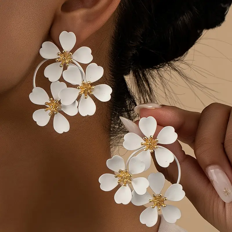 Boucles d'oreilles pendantes vintage à fleurs blanches