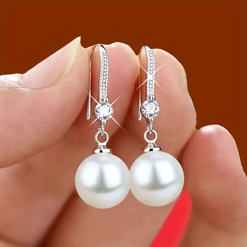 Boucles d'oreilles en perles dorées en zirconium