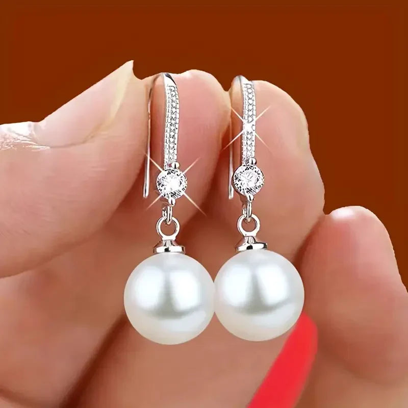 Boucles d'oreilles goutte en perles de zirconium lustré | Or blanc