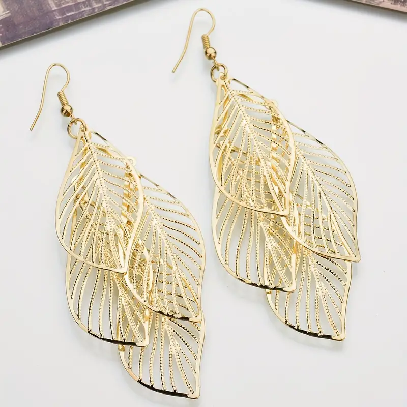 Boucles d'oreilles en forme de feuille dorée superposée