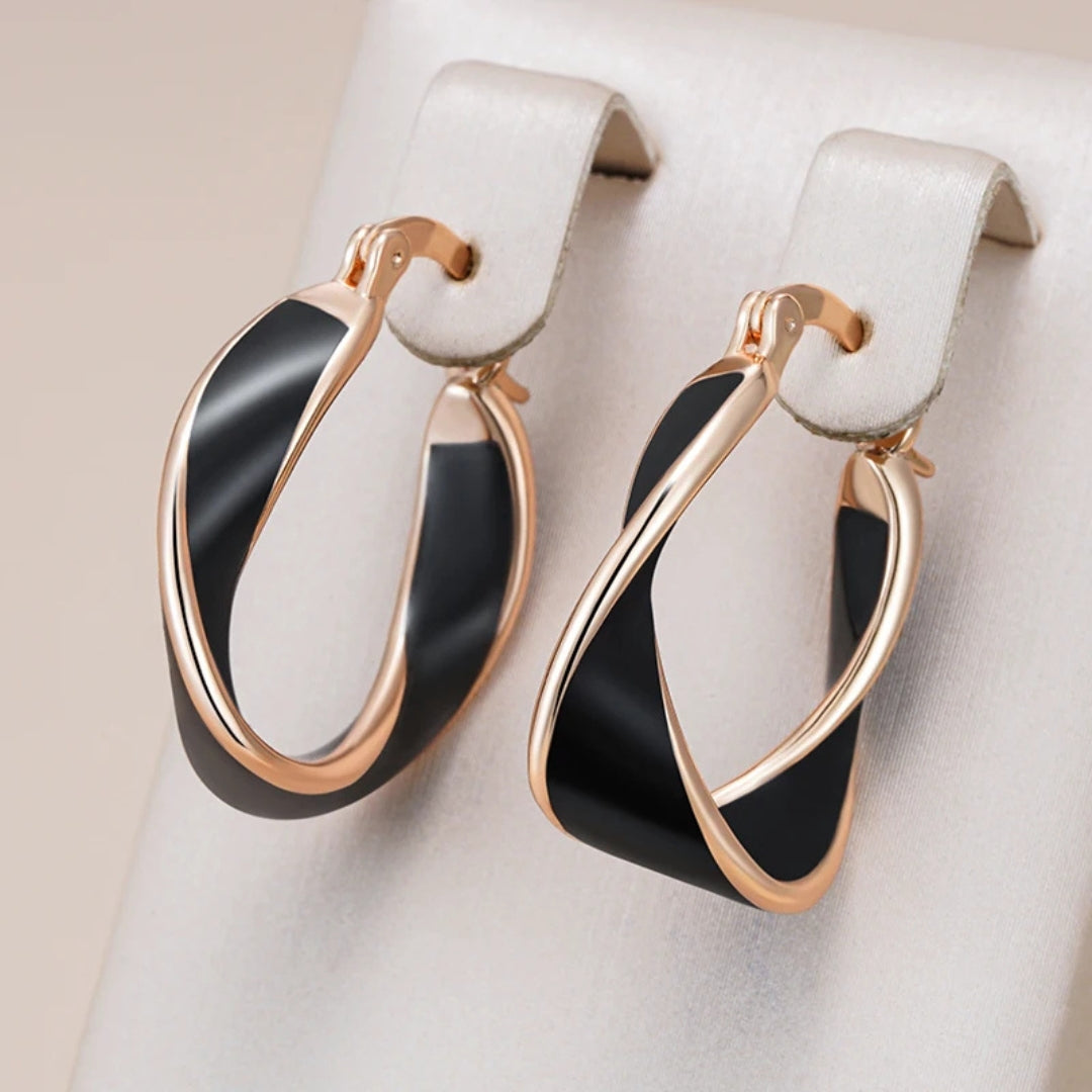 Boucles d'oreilles irrégulières noires élégantes