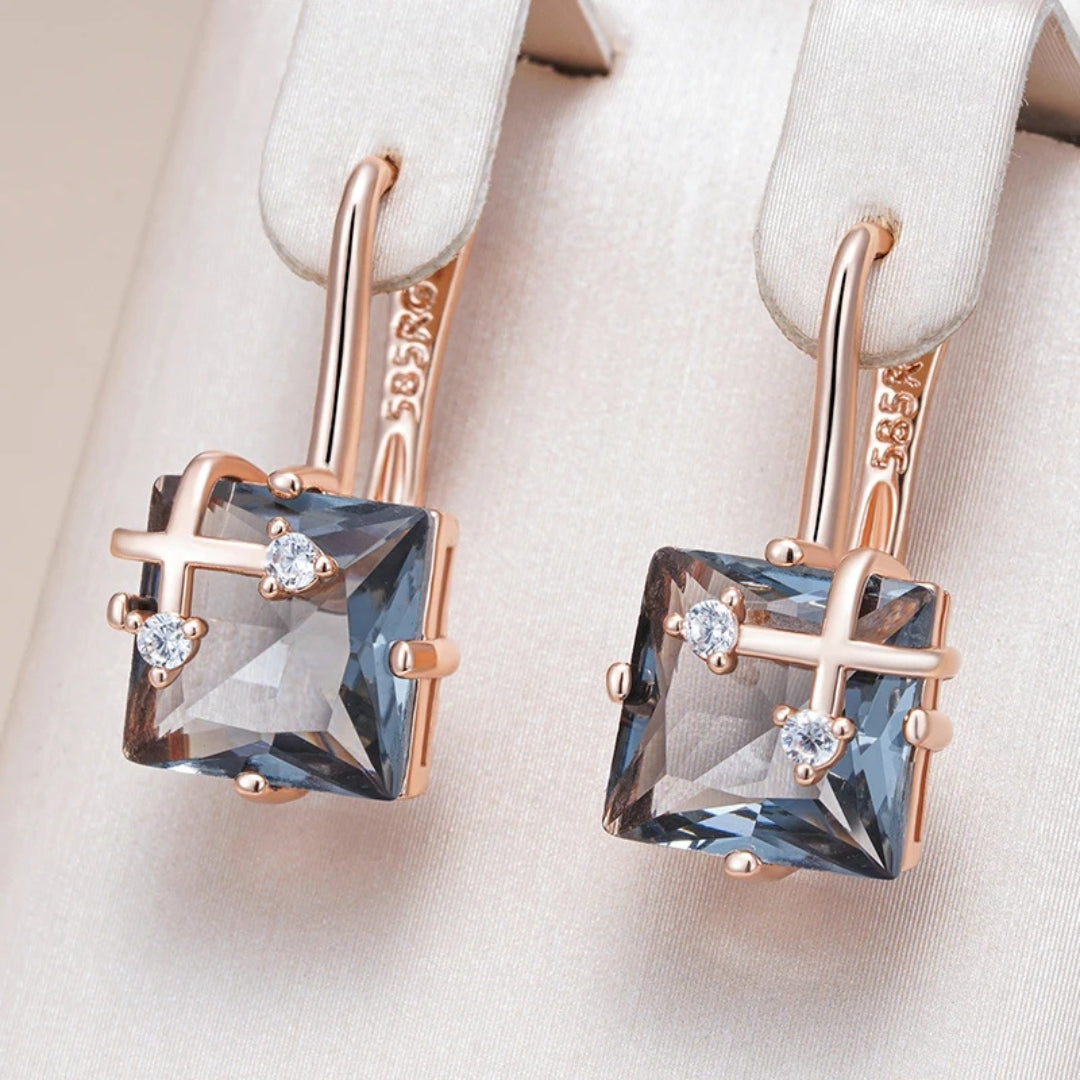 Boucles d'oreilles en or cubiques bleues élégantes