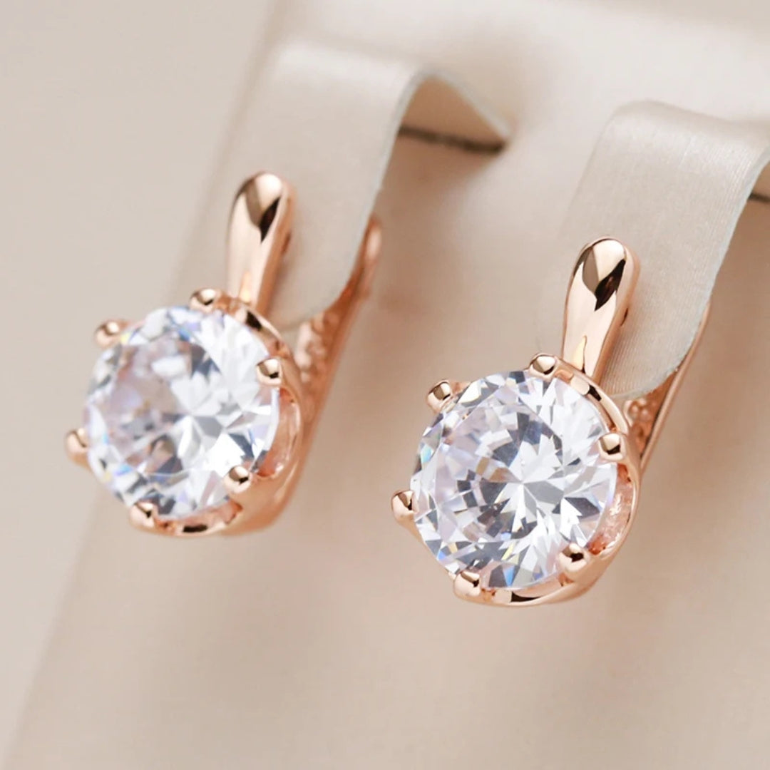 Boucles d'oreilles blanches élégantes et rondes