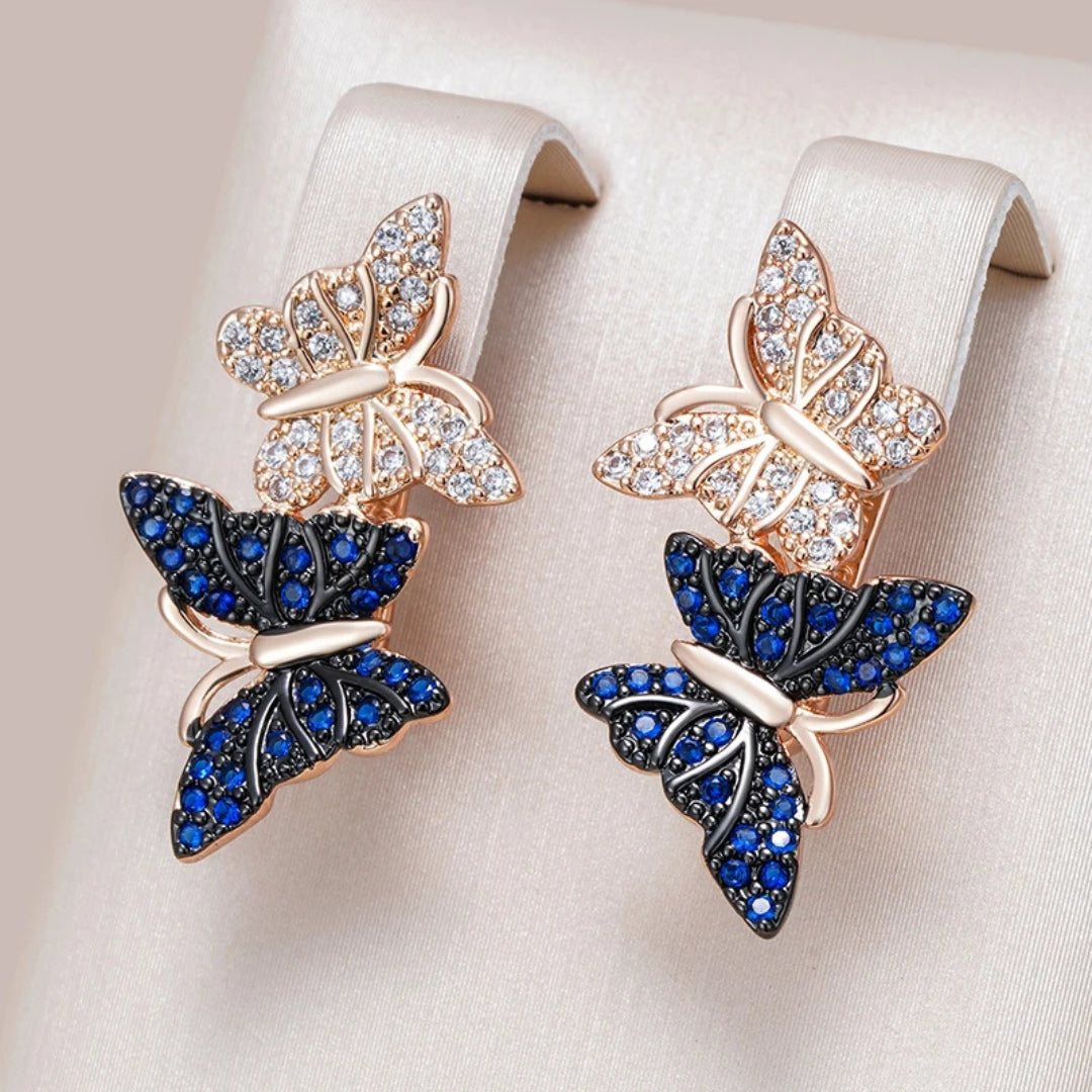 Boucles d'oreilles élégantes avec des papillons brillants