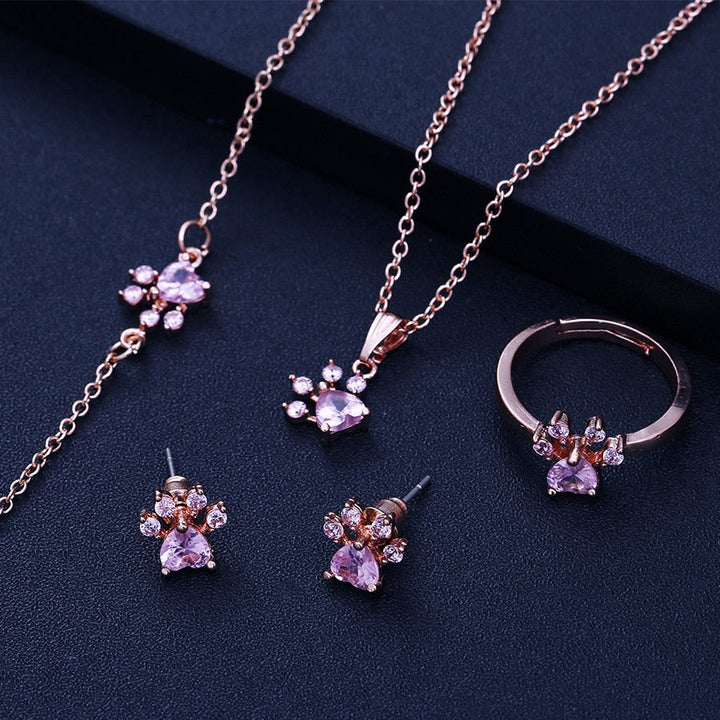 Ensemble de Bijoux Pattes en Or Rose – 4 Pièces avec Cœur en Zirconium (Bague, Collier, Boucles d'Oreilles, Bracelet)