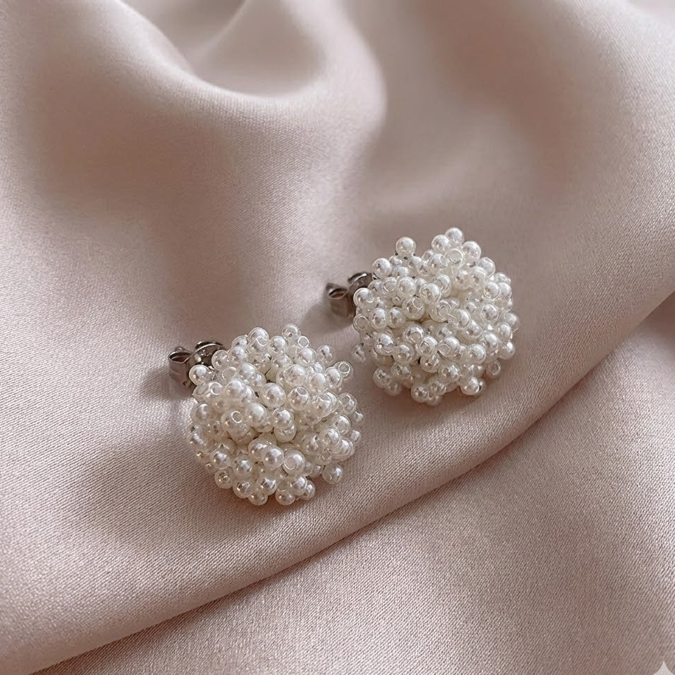 Boucles d'oreilles en perles incrustées classiques