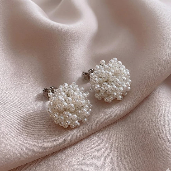 Boucles d'oreilles en perles incrustées classiques